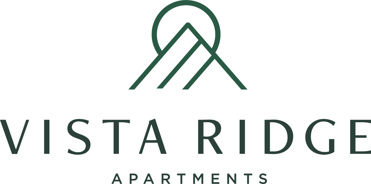 The image is a logo for Vista Ridge Apartments.